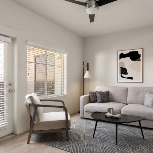 Gorgeous living areas to entertain and enjoy furnished living room with access to private balcony