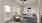 furnished living room with access to private balcony