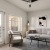 furnished living room with access to private balcony