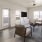 spacious living room with large windows