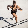 girl running up stairs