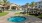 jacuzzi next to pool